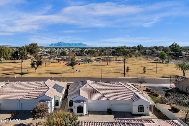 drone / aerial view featuring a mountain view