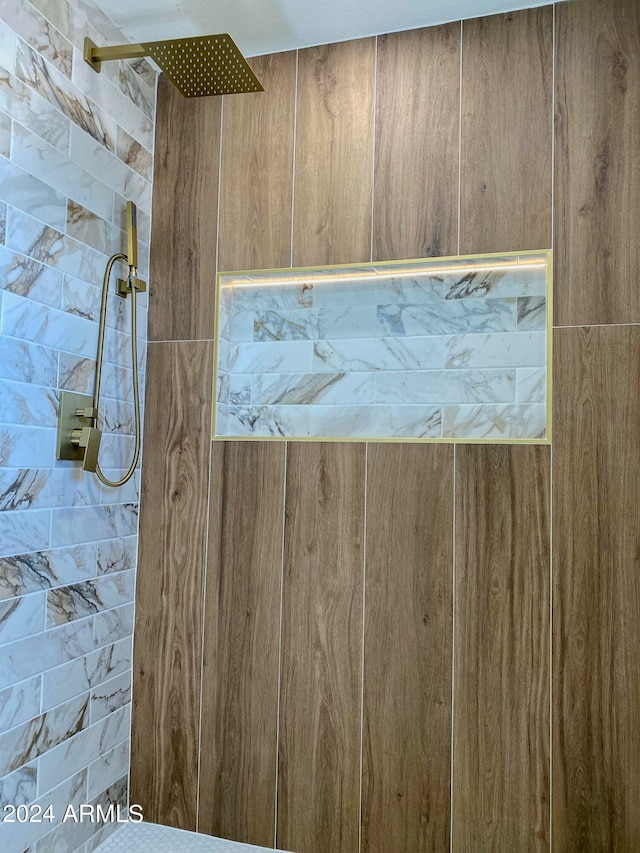 room details with a tile shower