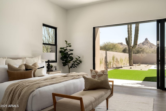 bedroom featuring wood finished floors