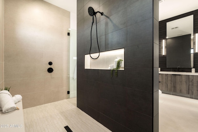 full bathroom featuring visible vents and walk in shower