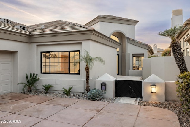 view of front of home featuring a garage