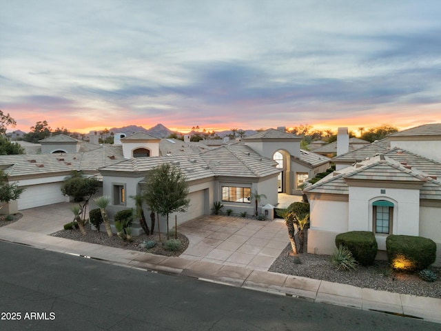 view of front of home with a garage