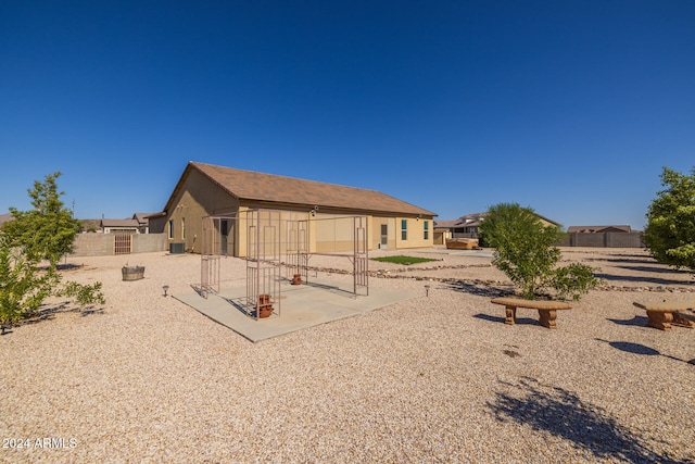 rear view of house featuring a patio area