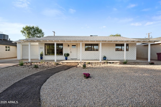 8524 E Mariposa Dr, Scottsdale, AZ 85251 - ranch-style home with driveway, cooling unit, a porch, and a garage