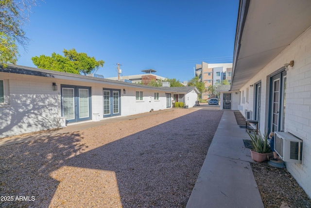 view of yard with a patio and cooling unit