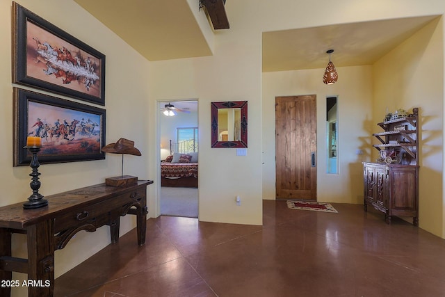 entrance foyer with ceiling fan