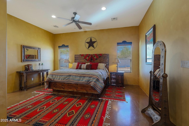 bedroom featuring hardwood / wood-style flooring and ceiling fan