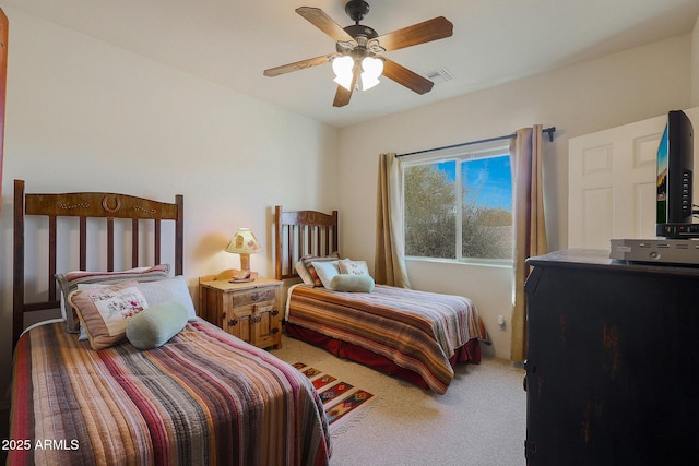 bedroom featuring carpet and ceiling fan