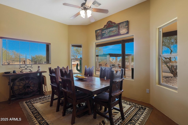 dining room featuring ceiling fan