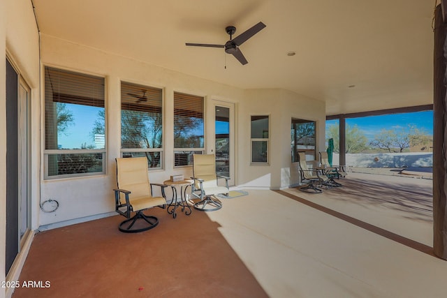 view of patio / terrace featuring ceiling fan