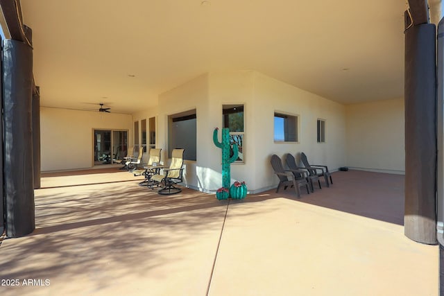 view of patio with ceiling fan