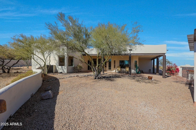 rear view of house featuring a patio area