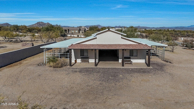 view of front facade featuring a mountain view