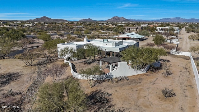 drone / aerial view featuring a mountain view