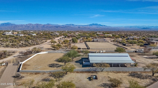 drone / aerial view featuring a mountain view