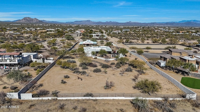 birds eye view of property featuring a mountain view