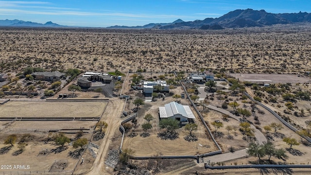 drone / aerial view featuring a mountain view