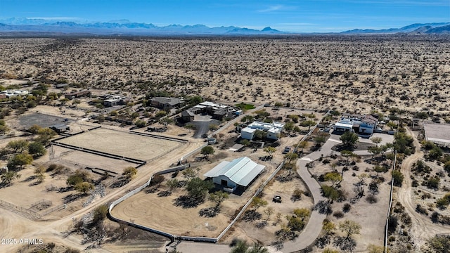 drone / aerial view featuring a mountain view