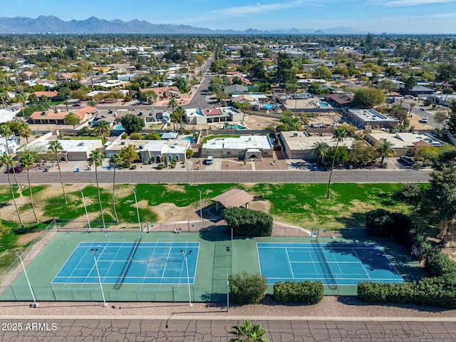 drone / aerial view with a residential view and a mountain view