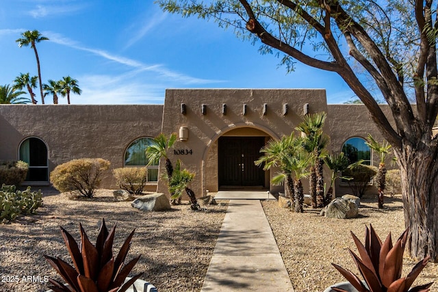 view of pueblo-style home