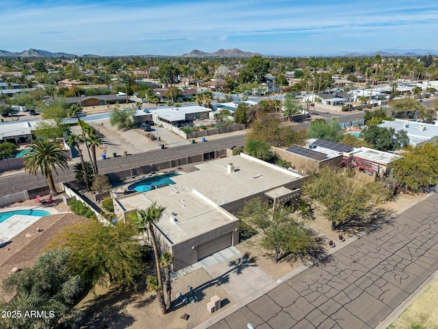 drone / aerial view with a residential view and a mountain view