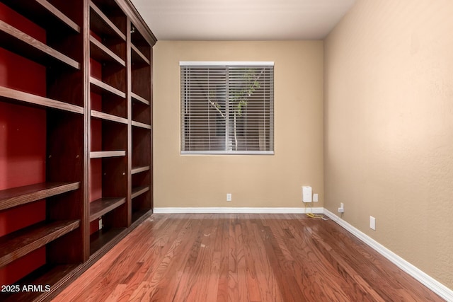 22063 N 77th St, Scottsdale, AZ 85255 - unfurnished room featuring wood finished floors and baseboards