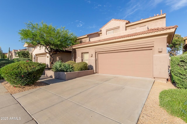 22063 N 77th St, Scottsdale, AZ 85255 - mediterranean / spanish-style home featuring driveway, stucco siding, a garage, and a tiled roof