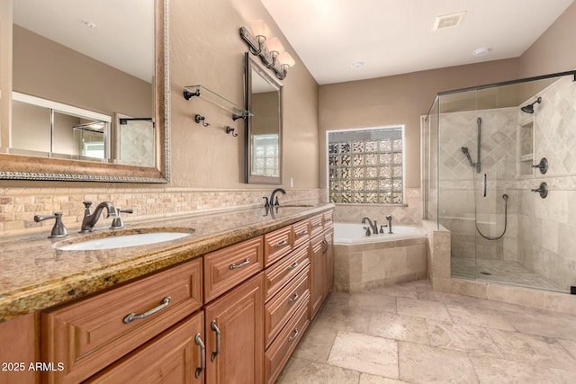 22063 N 77th St, Scottsdale, AZ 85255 - full bathroom with a bath, a stall shower, double vanity, and stone tile flooring