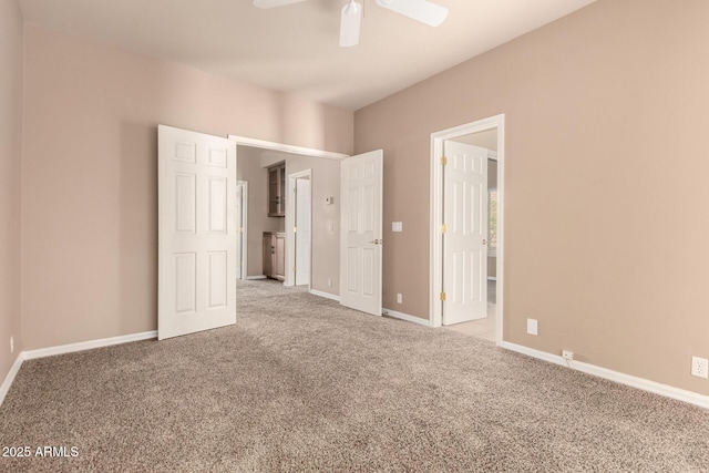 22063 N 77th St, Scottsdale, AZ 85255 - unfurnished bedroom featuring carpet flooring, baseboards, and ceiling fan