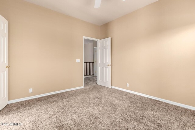 22063 N 77th St, Scottsdale, AZ 85255 - spare room with carpet, a ceiling fan, and baseboards