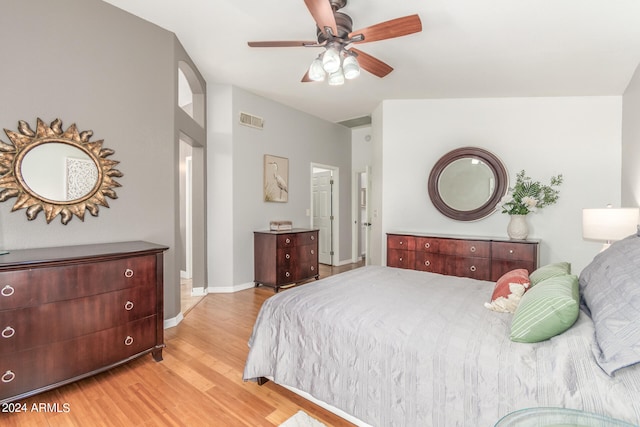 bedroom with light wood-type flooring and ceiling fan