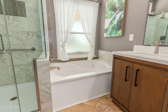 bathroom with vanity and plus walk in shower