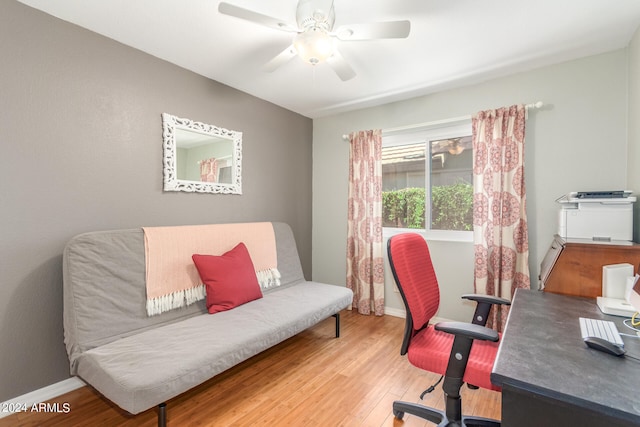 office area with hardwood / wood-style floors and ceiling fan