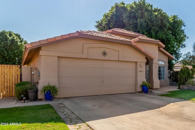 view of front of property featuring a garage