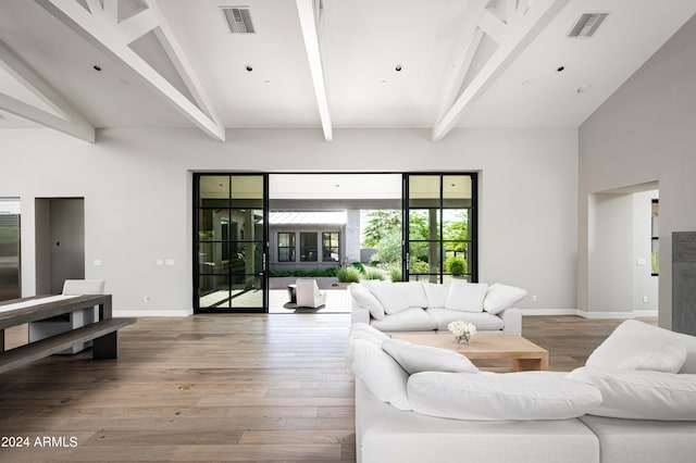 living room with high vaulted ceiling, beamed ceiling, and wood-type flooring