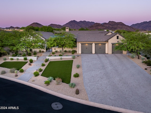 view of front of house with a mountain view