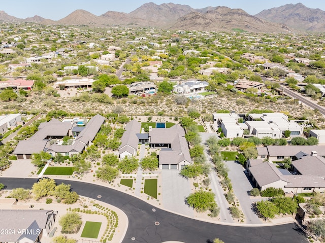 birds eye view of property featuring a mountain view