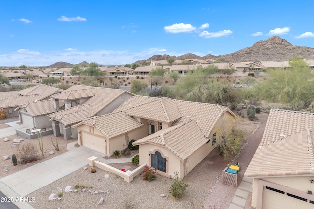 aerial view with a mountain view and a residential view