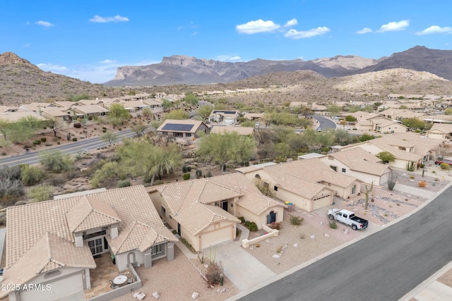 exterior space with a mountain view and a residential view