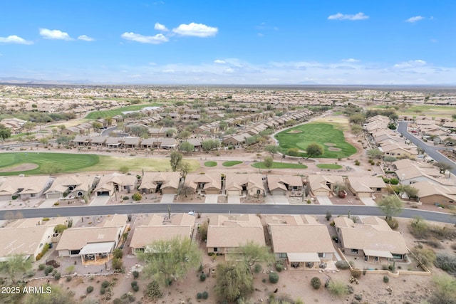 bird's eye view with golf course view and a residential view