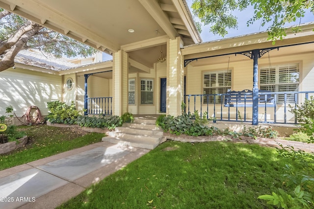 doorway to property with covered porch