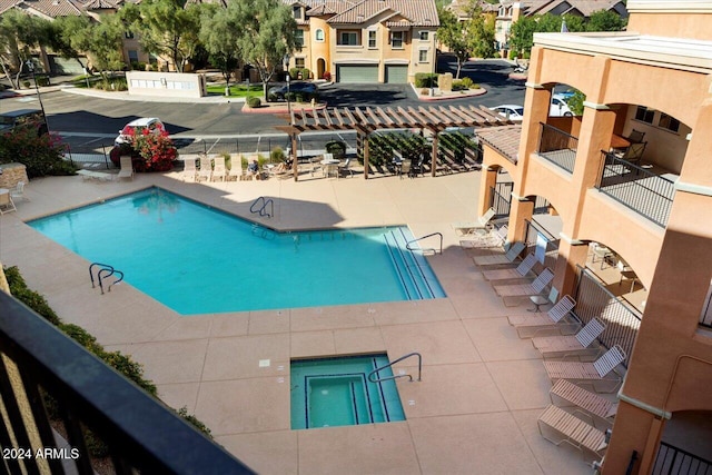 view of swimming pool featuring a patio