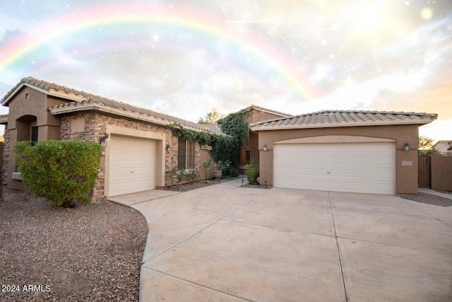 view of front of property featuring a garage