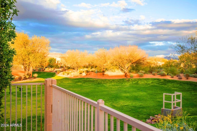 surrounding community featuring a lawn