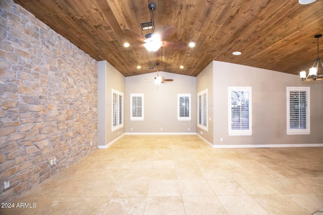 spare room featuring visible vents, baseboards, lofted ceiling, wood ceiling, and ceiling fan with notable chandelier