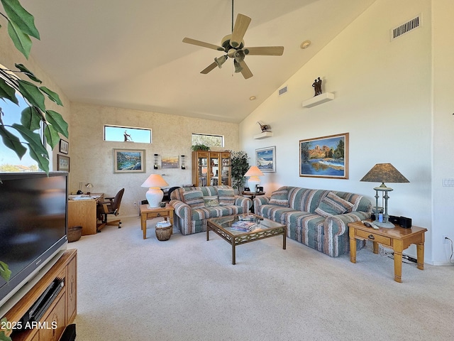 carpeted living room featuring ceiling fan, high vaulted ceiling, and visible vents