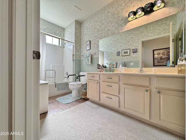 bathroom with visible vents, toilet, combined bath / shower with glass door, vanity, and wallpapered walls