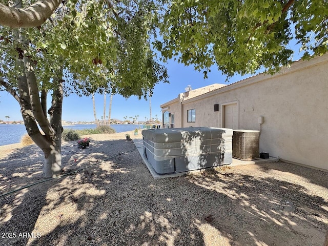 view of yard with a water view