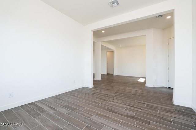 empty room featuring dark hardwood / wood-style floors