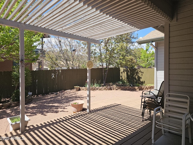 view of patio / terrace with a pergola and fence